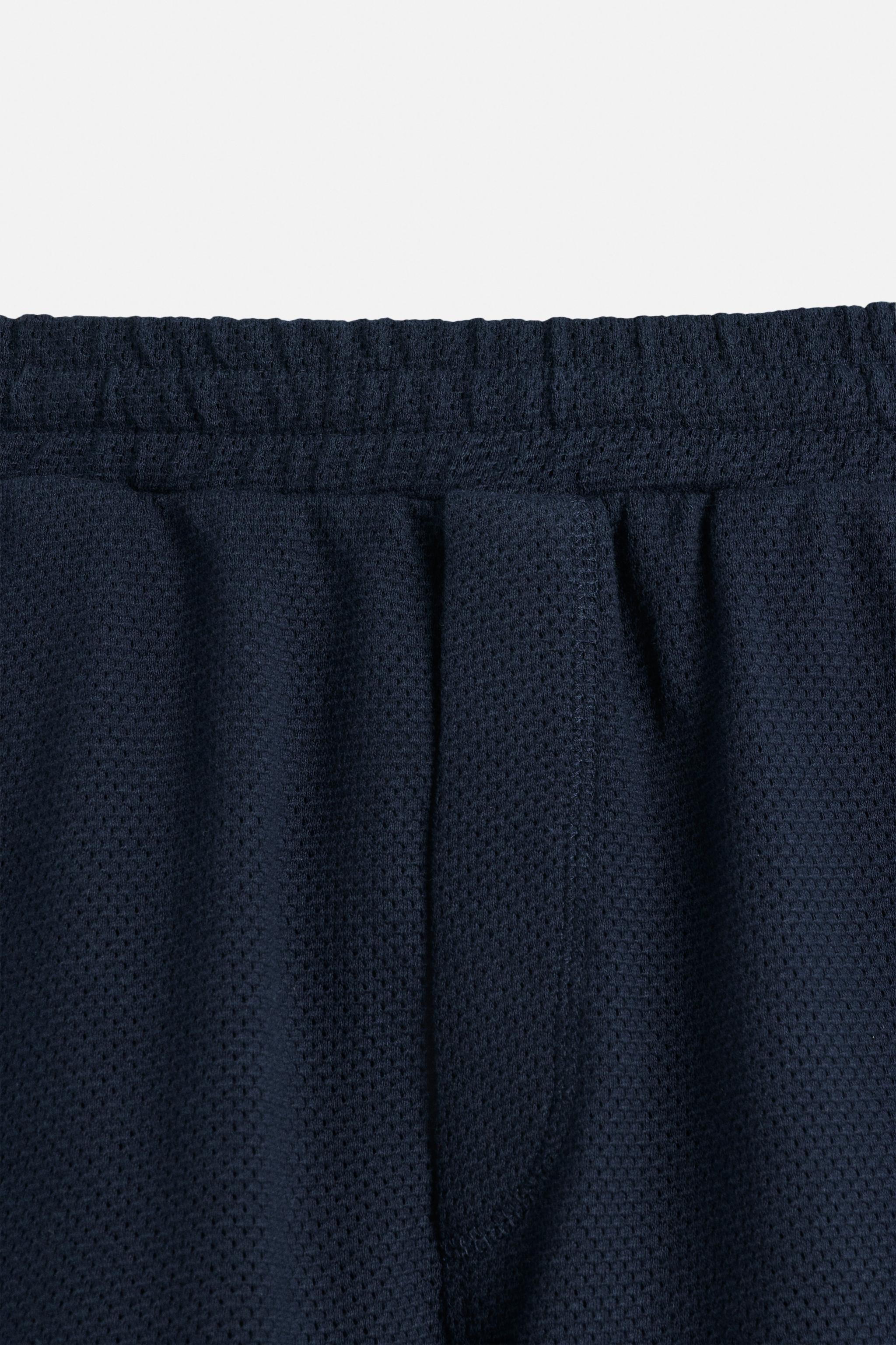 TEXTURED RELAXED FIT SHORTS